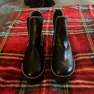 Black ankle boots with studs New without tag size 7.5. Great style and comfort!